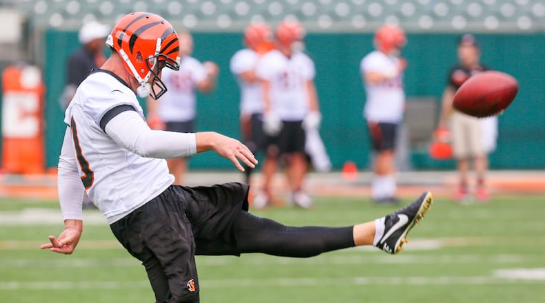 Bengals punter Kevin Huber (10) participates in a team practice at Paul Brown Stadium,  Tuesday, June 13, 2017. GREG LYNCH / STAFF