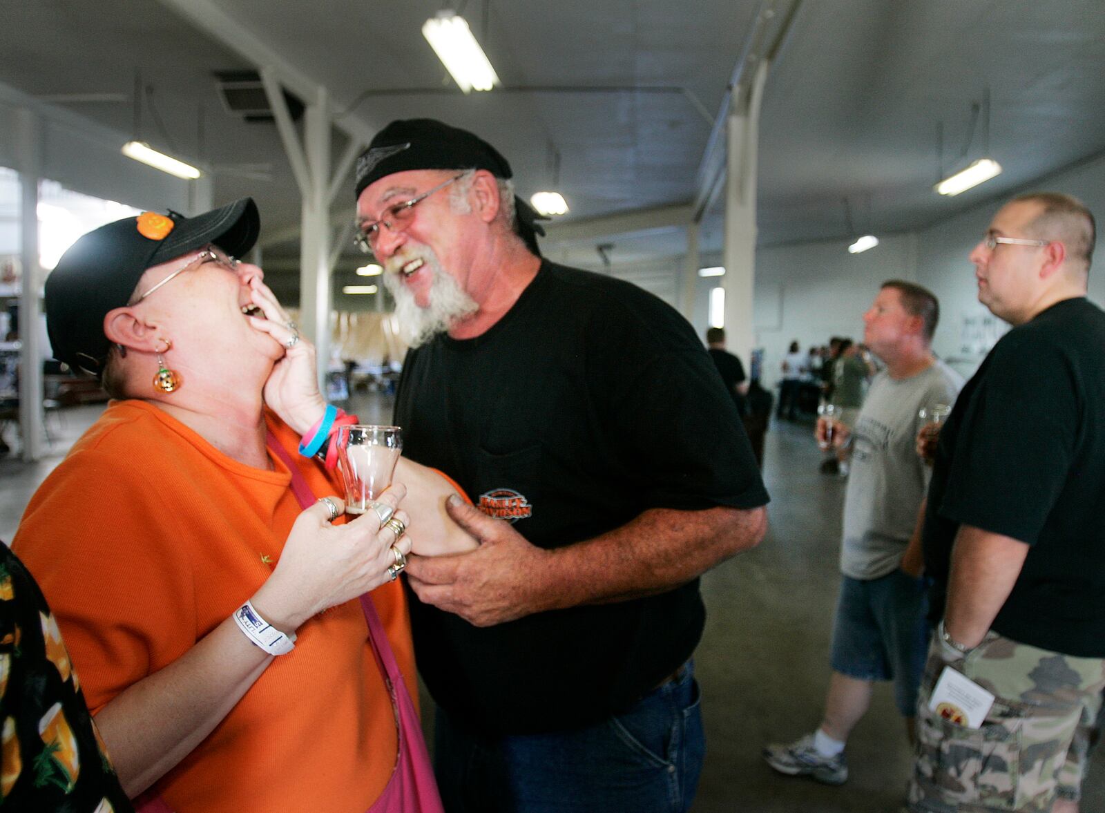 Archived photo: Old friends, Patti Russell, left and Kim Medlin, both from Dayton enjoy each others company at the 2nd Annual Miami Valley Beer Fest held at the Montgomery County Fairgrounds. Jim Noelker/Dayton Daily News