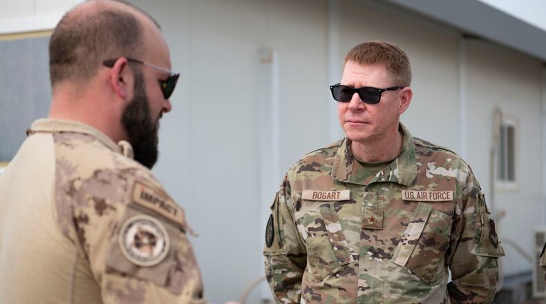 U.S. Air Force Brig. Gen. Robert Bogart, Headquarters Air Combat Command command surgeon, is briefed during a tour at Ali Al Salem Air Base, Kuwait, May 8, 2023. Bogart will assume command of the 71tth Human Performance Wing Aug. 21. (U.S. Air Force photo by Staff Sgt. Miranda Mahoney)