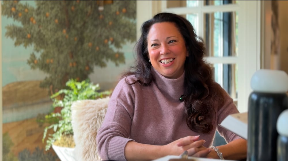 Smiling Katie Hill, entrepreneur and founder of UnlistedHomes.com, pictured in Dayton ahead of her company’s TechCrunch debut.