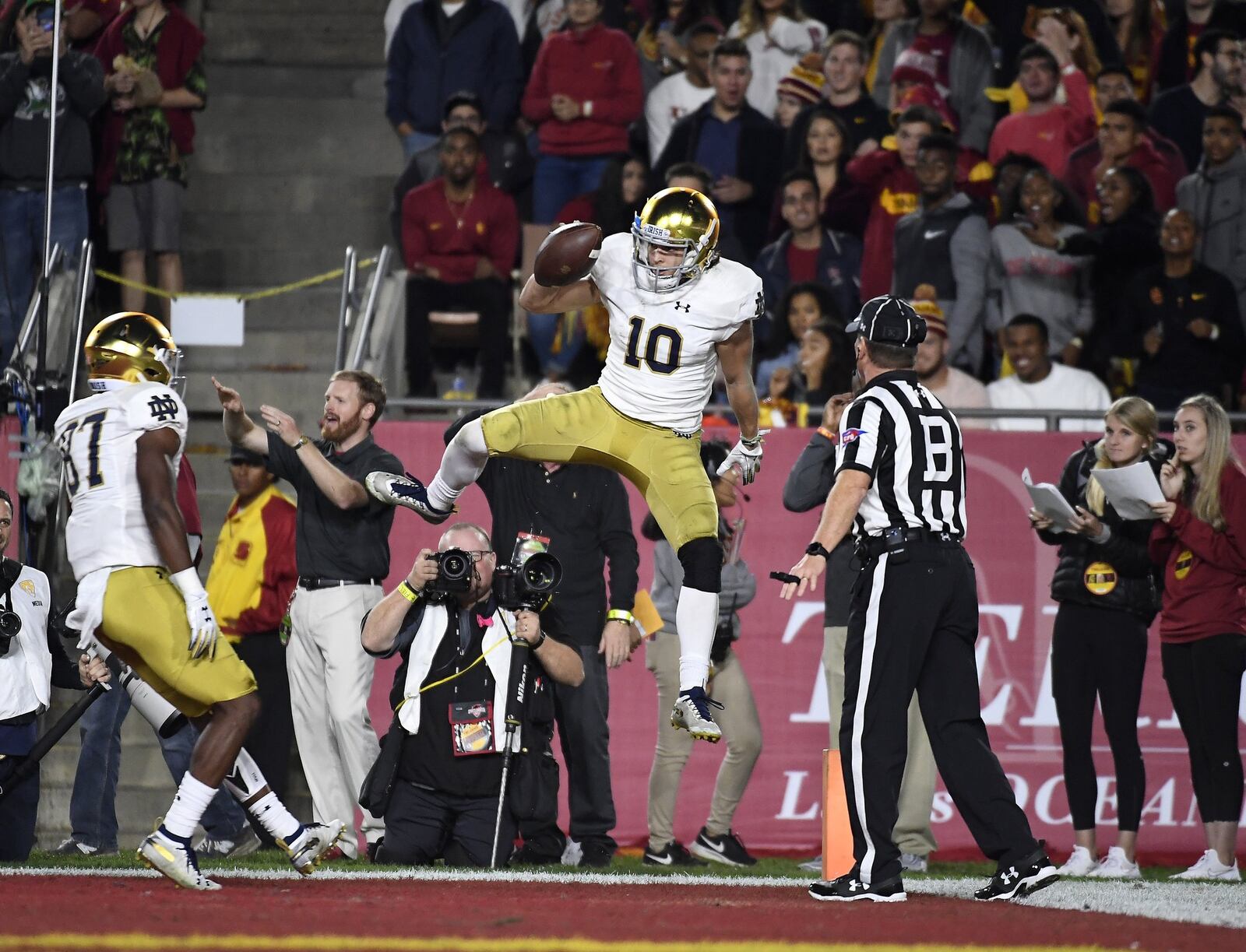 Chris Finke (10) of the Notre Dame Fighting Irish celebrates his touchdown with Michael Young #87 against the USC Trojans during the first half at Los Angeles Memorial Coliseum on November 24, 2018 in Los Angeles, California. (Photo by Kevork Djansezian/Getty Images)