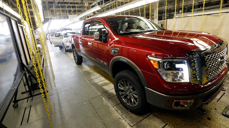 A newly completed Titan rolls off the line at the Nissan Canton Vehicle Assembly Plant in Canton, Miss. in 2016. AP Photo/Rogelio V. Solis
