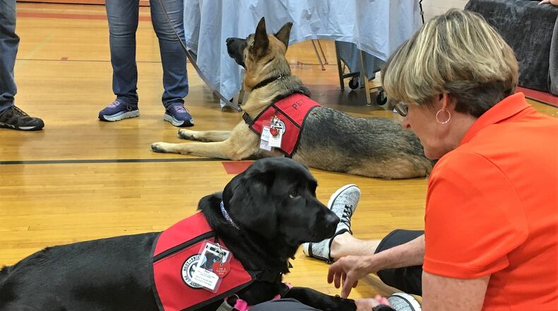 Best Friends Pet Assisted Therapy was one of the groups participating in the Love Shack event at Northridge High School, offering free wellness services to those affected by the Memorial Day tornadoes. KATIE WEDELL/STAFF