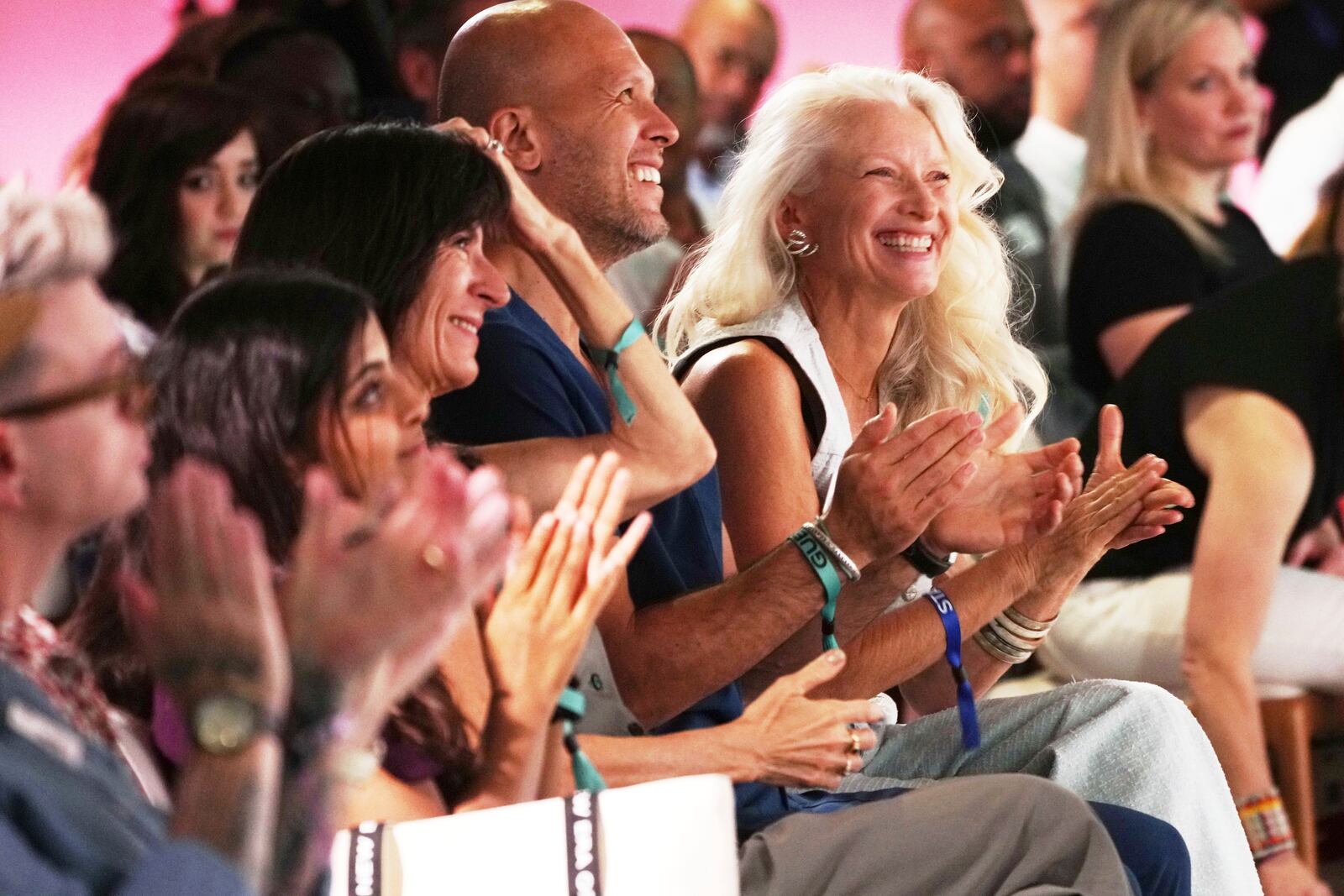 Attendees at the The Elevate Prize Foundation's Make Good Famous Summit applaud during the opening session, Tuesday, May 13, 2025, in Miami Beach, Fla. (AP Photo/Marta Lavandier)