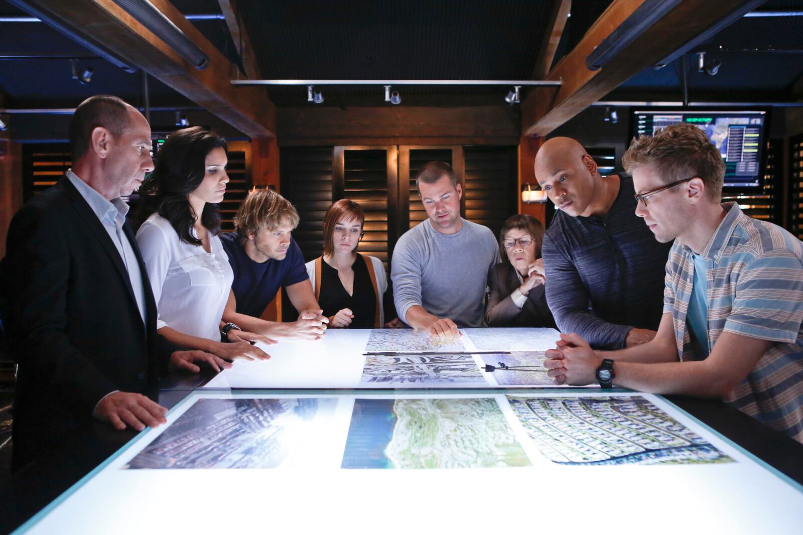 The NCIS: LA team in the OPS center discussing a case. Pictured (L-R): Miguel Ferrer (NCIS Assistant Director Owen Granger). Daniela Ruah (Special Agent Kensi Blye), Eric Christian Olsen (LAPD Liaison Marty Deeks), Renne Felice Smith (Intelligence Analyst Nell Jones), Eric Christian Olsen (LAPD Liaison Marty Deeks), Chris O\'Donnell (Special Agent G. Callen), Linda Hunt (Henrietta "Hetty" Lange), LL COOL J (Special Agent Sam Hanna), Barrett Foa (Tech Operator Eric Beale). NCIS: LOS ANGELES airs Tuesdays, (9:00-10:00 PM, ET/PT) on the CBS Television Network.  Photo: Cliff Lipson/CBS ÃÂÃÂ©2013 CBS Broadcasting, Inc. All Rights Reserved.