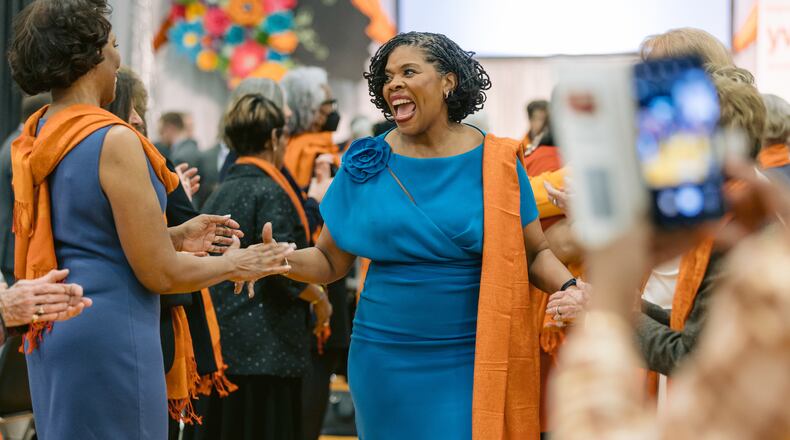 YWCA Dayton is asking local artists to draw inspiration from the persimmon colored pashminas that past and present honorees wear at the event (CONTRIBUTED PHOTO).