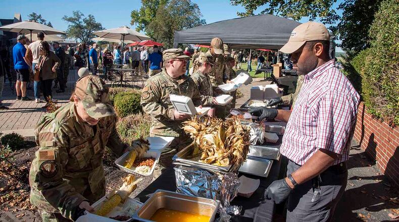 Airman from Wright-Patterson Air Force Base enjoy a buffet barbeque at the Wright-Patt Club, Sept. 30. The inaugural Wright-Patt teambuilding Jamboree allowed Airmen and civilian to build and strengthen unit cohesion and teamwork, the event was the culmination of the Commander’s cup, where teams competed throughout the week in various events. (U.S. Air Force photo by Jack Gardner)