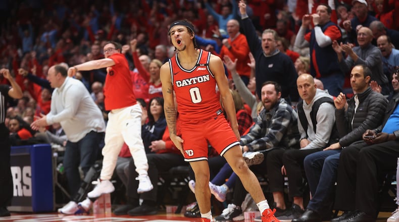 Dayton's Javon Bennett reacts after making a 3-pointer to give Dayton a 59-54 lead in the second half against Virginia Commonwealth on Friday, Feb. 7, 2025, at UD Arena.. David Jablonski/Staff