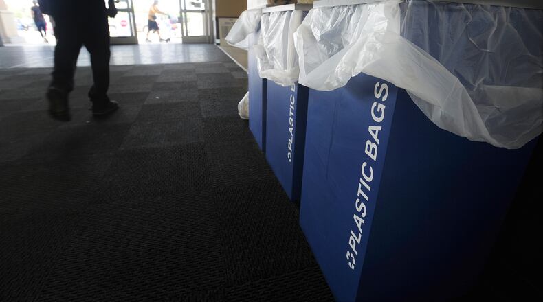 The Meijer Store on Wilmington Pike has been excepting and recycling plastic bags for over ten years. The city of Dayton has new green rules that might ban plastic shopping bags, and push for more recycling. MARSHALL GORBY\STAFF