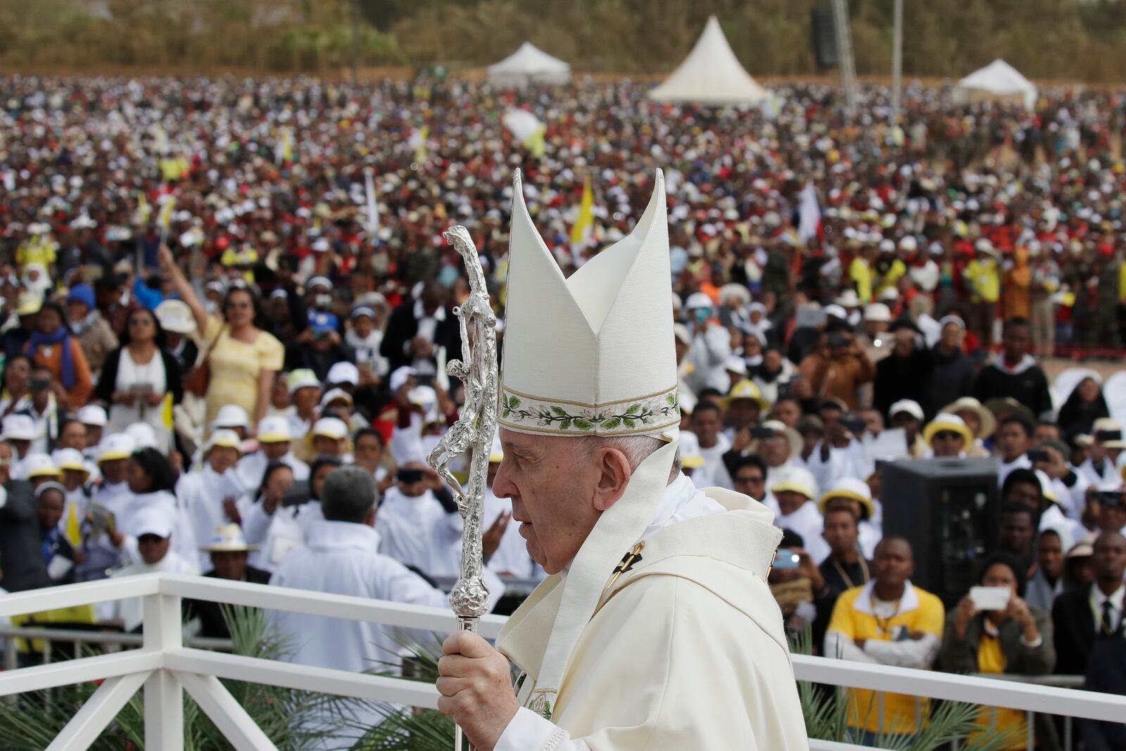 FILE - Pope Francis walks with the pastoral staff as he celebrates Mass in Antananarivo, Madagascar, Sept. 8, 2019. (AP Photo/Alessandra Tarantino, File)