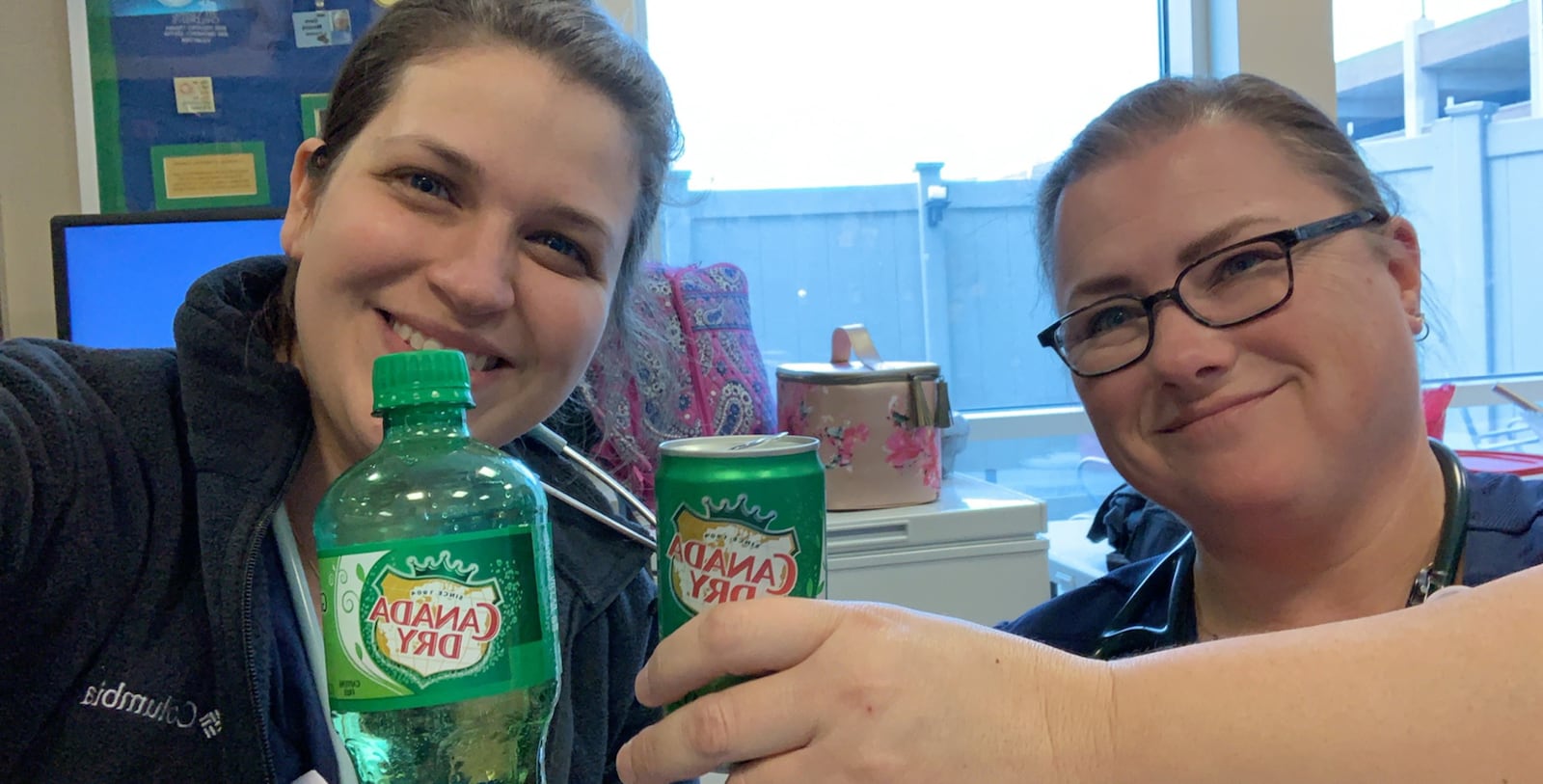 Abigeal Kaszar, left, with her coworker from Dayton Childrens Hospital Denise Tracy from Dayton. The pair is toasting Kaszar's mom, Anne Katherine, who passed away in 2017 with her mom's favorite beverage, Ginger Ale. Kaszar said she made many good friends while in Dayton. CONTRIBUTED