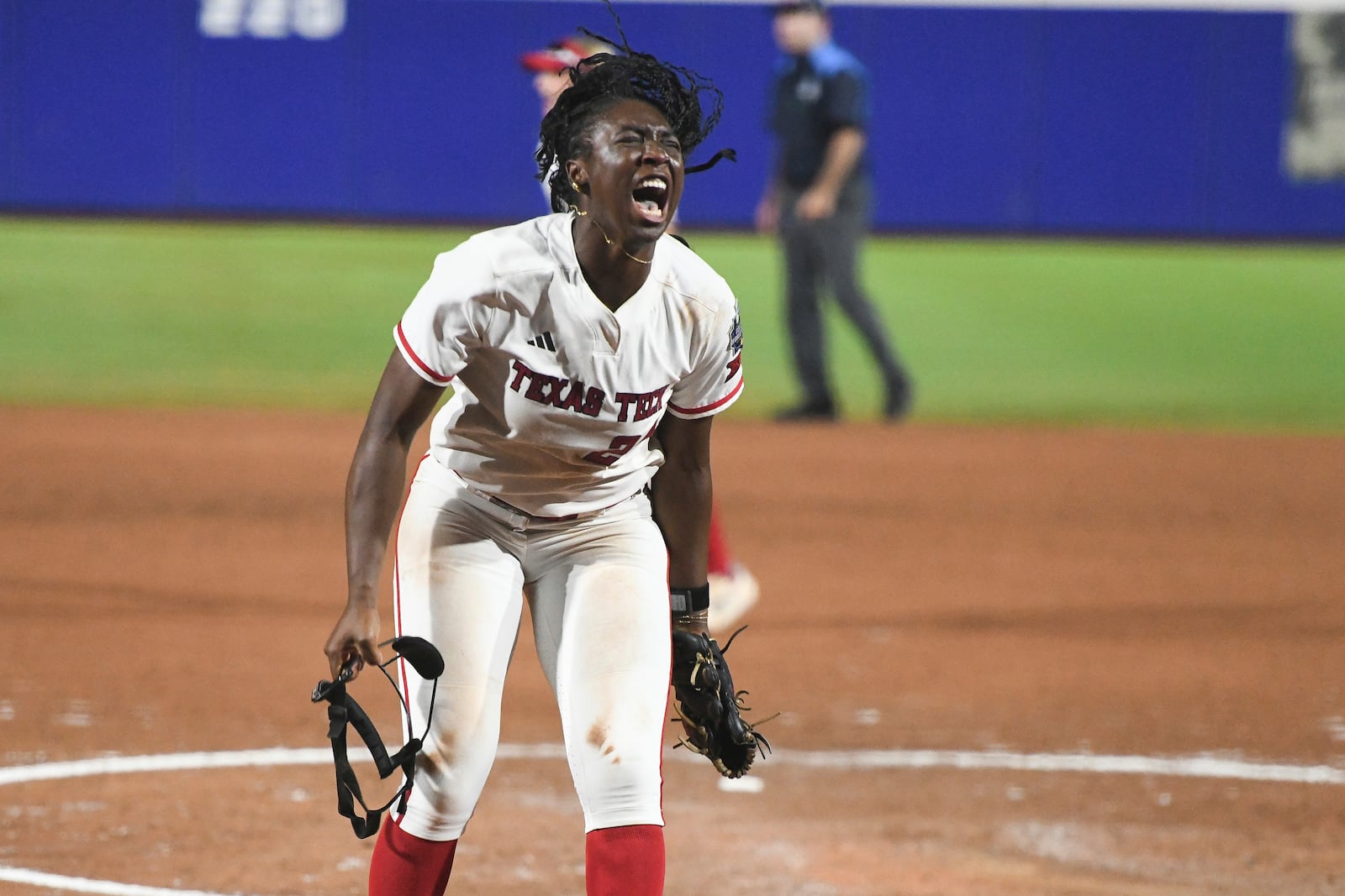 Texas Tech pitcher NiJaree Canady celebrates during the second game of the NCAA softball Women's College World Series finals against Texas in Oklahoma City, Thursday, June 5, 2025. (AP Photo/Kyle Phillips)