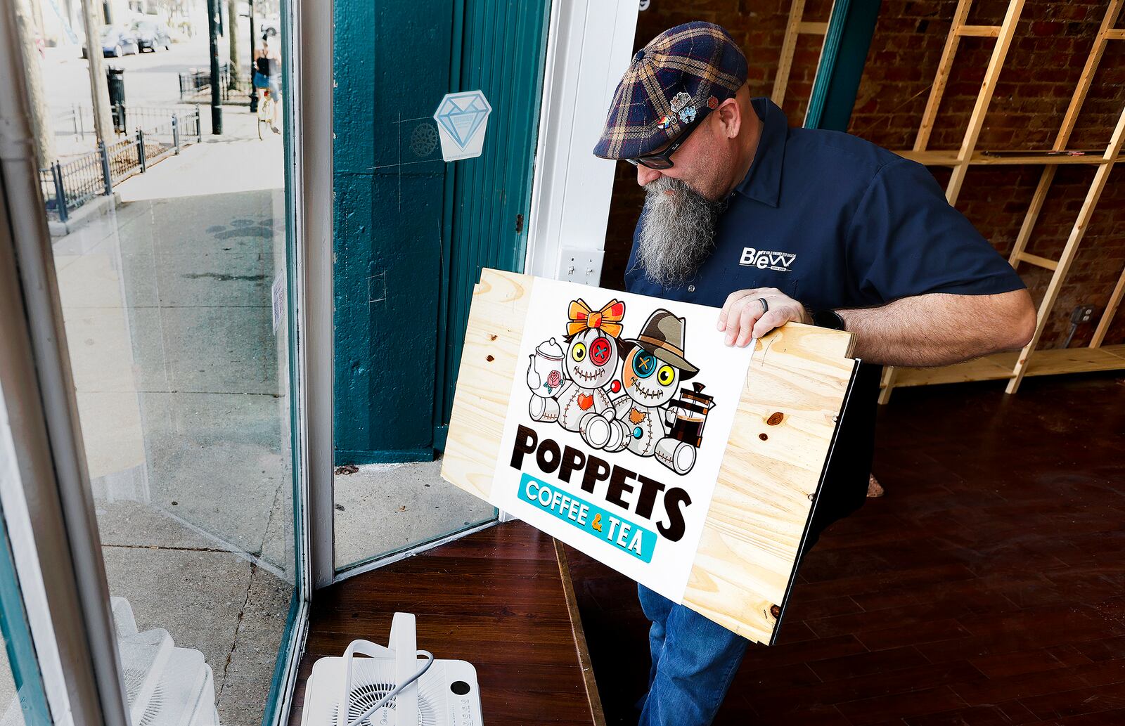 Poppets Coffee & Tea hopefully will open at 510 E. Fifth St. in the Oregon District next month, said Michael Thomas, who owns the business with his wife, Karen. Poppets already has a space in the 2nd Street Market, which will remain in operation. CORNELIUS FROLIK / STAFFMARSHALL GORBY\STAFF