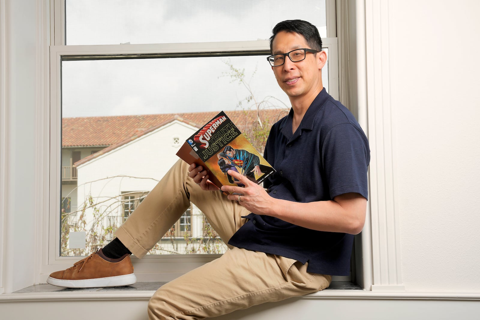 Comic book writer Gene Yang poses for a portrait Tuesday, April 1, 2025, in San Jose, Calif. (AP Photo/Tony Avelar)