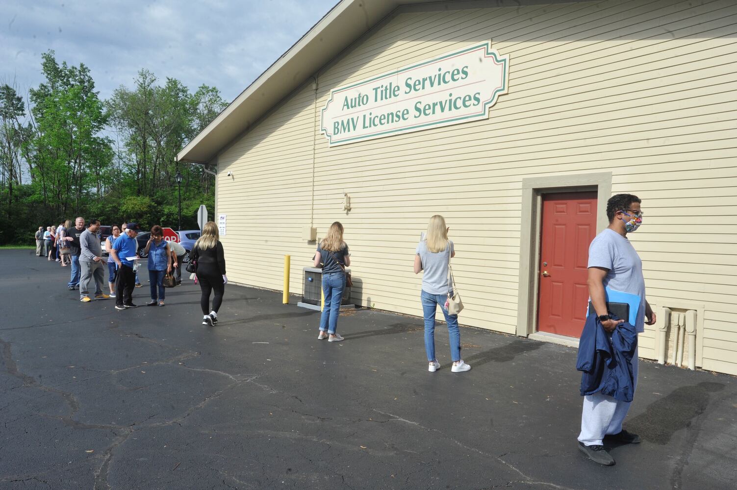 PHOTOS: Long lines as state BMV offices reopen after coronavirus shutdowns