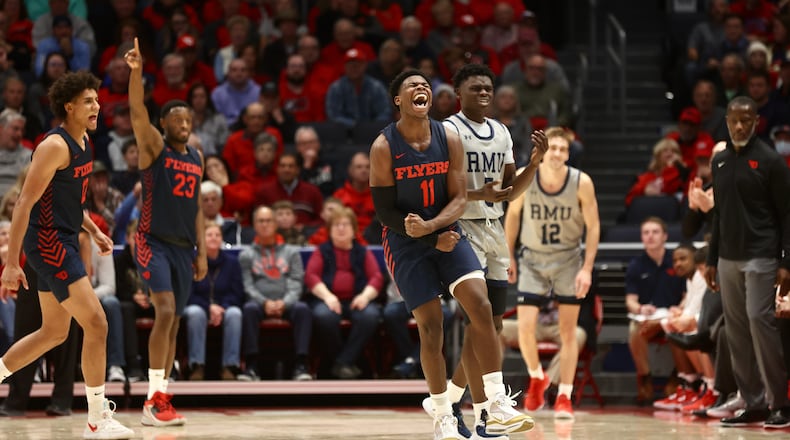Dayton's Malachi Smith reacts after a play during a game against Robert Morris on Saturday, Nov. 19, 2022, at UD Arena. David Jablonski/Staff