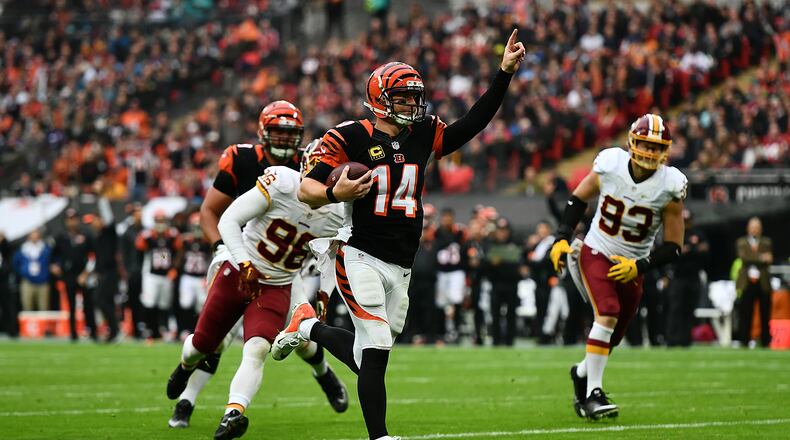 LONDON, ENGLAND - OCTOBER 30: Andy Dalton #14 of the Cincinnati Bengals celebrates as he runs in for a touchdown during the NFL International Series Game between Washington Redskins and Cincinnati Bengals at Wembley Stadium on October 30, 2016 in London, England. (Photo by Dan Mullan/Getty Images)