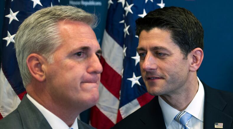 House Speaker Paul Ryan of Wis., right, speaks with House Majority Leader Kevin McCarthy of Calif. during a news conference on Capitol Hill in Washington, Tuesday, Nov. 15, 2016, following a House Republican leadership meeting. (AP Photo/Cliff Owen)