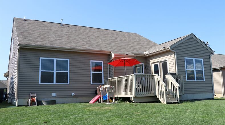 Patio doors from the morning room open to the rear deck and open back yard.