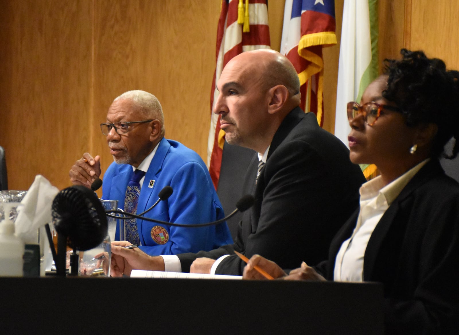 Dayton Mayor Jeffrey Mims Jr. (in blue) and City Commissioners Shenise Turner and Matt Joseph during a city commission meeting. Turner-Sloss is challenging Mims for the mayor's seat in November. CORNELIUS FROLIK / STAFF