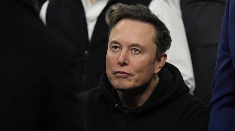 FILE - Elon Musk attends the finals for the NCAA wrestling championship, Saturday, March 22, 2025, in Philadelphia. (AP Photo/Matt Rourke, file)
