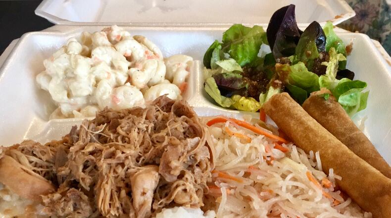 HaolePino is a food truck that serves Hawaiian and Filipino food in the Dayton-area. Here is the Ultimate Filipino Mixed Plate, which includes chicken adobo over rice, pancit and lumpia. ALLEGRA CZERWINSKI / STAFF