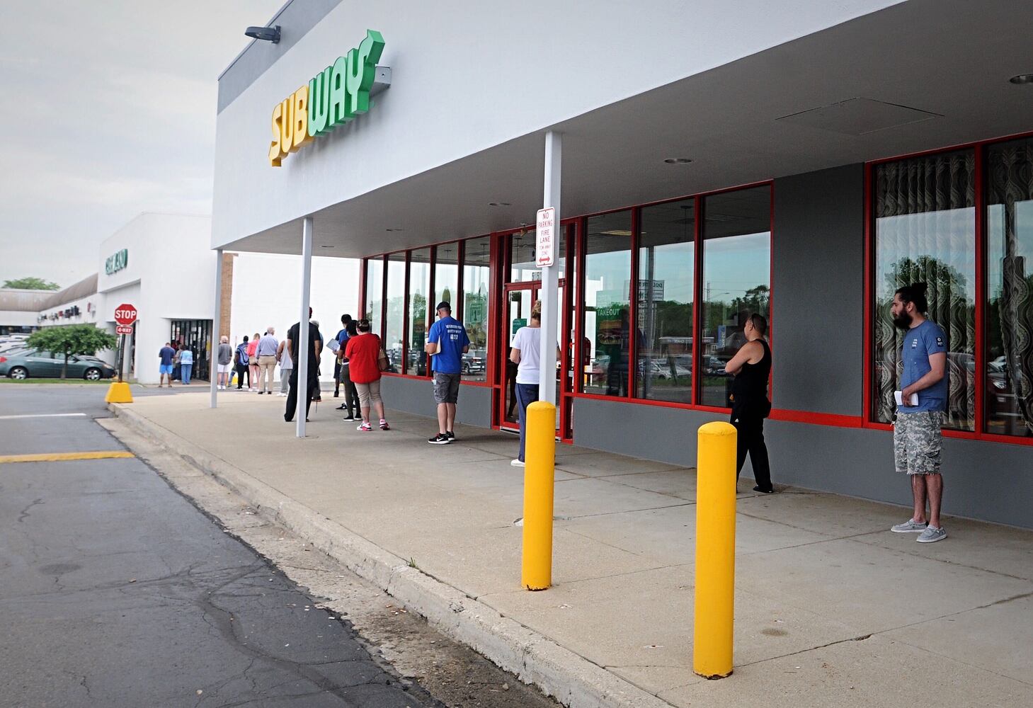 PHOTOS: Long lines as state BMV offices reopen after coronavirus shutdowns
