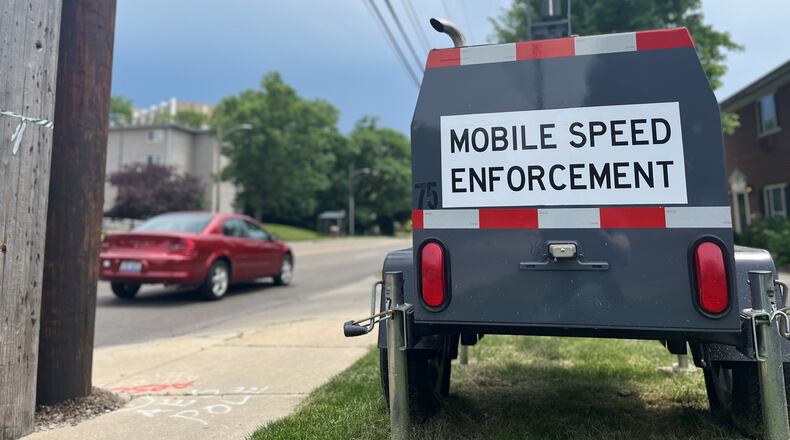 A mobile speed enforcement trailer on Wilmington Avenue in Dayton. Police have deployed trailers along a handful of roadways citywide. CORNELIUS FROLIK / STAFF