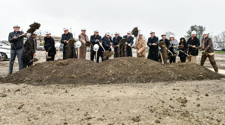 Kettering Health Network and Hamilton officials break ground on Hamilton Health Center on Main during a ceremony Monday, April 16 at the site of the former Skating on Main skating rink on Main Street in Hamilton. NICK GRAHAM/STAFF
