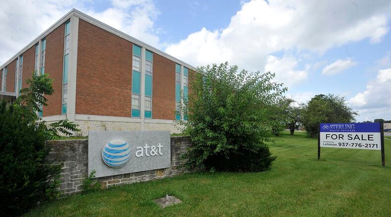 A plan to rezone the former AT&T building on Woodman Drive in Kettering to allow for more senior housing may be approved this week. MARSHALL GORBY/STAFF
