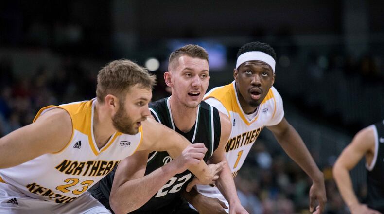 Wright State’s Parker Ernsthausen (center) against Northern Kentucky last season. Joseph Craven/CONTRIBUTED