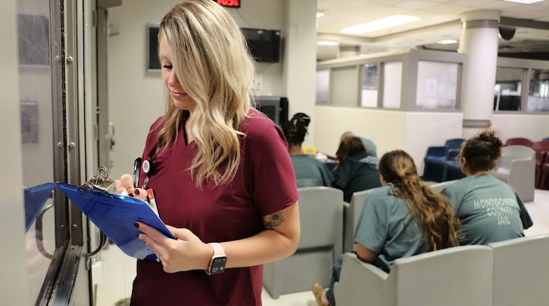 Brittanie Holzfaster, mental health director for NaphCare, Inc. pictured at the Montgomery County Jail in September 2023, where there is limited room to provide inmates with privacy. FILE