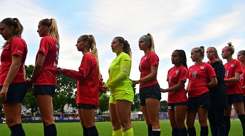 Dayton stands for the national anthem before a game against La Salle on Sept. 23, 2021, at Baujan Field. Photo by Erik Schelkun