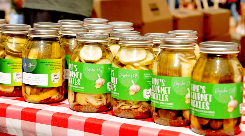 You can find an assortment of pickled-themed foods including pickle egg rolls, dill pickle popcorn, deep fried pickles and many other unique pickle dishes at Pickle Fest on Saturday, June 29 at Austin Landing. DAVID A. MOODIE/CONTRIBUTING PHOTOGRAPHER