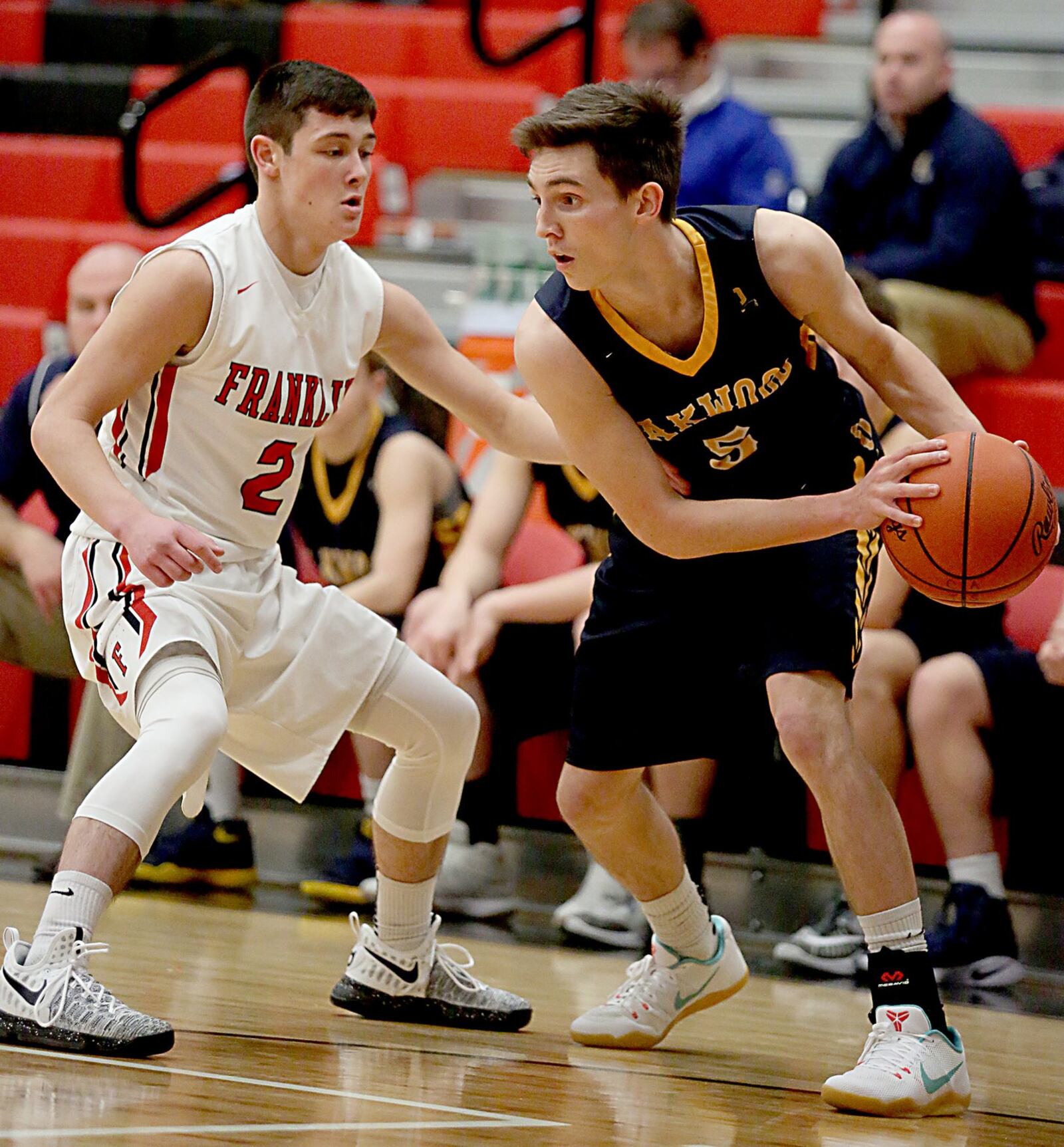 Oakwood’s Brendan Talarczyk is covered by Franklin’s Payton Knott during Tuesday night’s game at Darrell Hedric Gymnasium in Franklin. CONTRIBUTED PHOTO BY E.L. HUBBARD