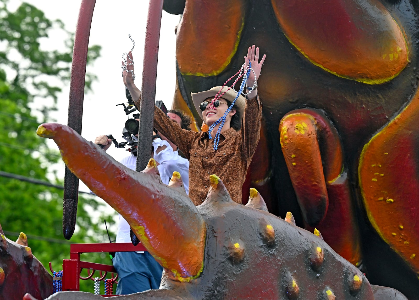"American Idol" finalist John Foster is honored with a parade, Wednesday, May 14, 2025, in his hometown of Addis, La., before the television show's finale. (Hilary Scheinuk/The Advocate via AP)
