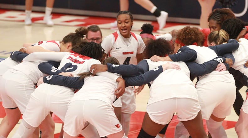 Dayton huddles before a game against Lipscomb on Nov. 5, 2019, at UD Arena. David Jablonski/Staff