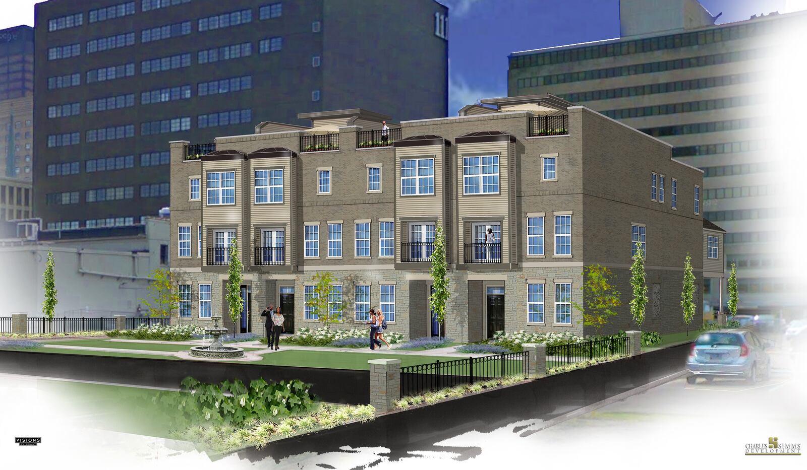 A rendering of the last four townhomes in the Monument Walk community. The development will have green space and an outdoor fountain. SUBMITTED