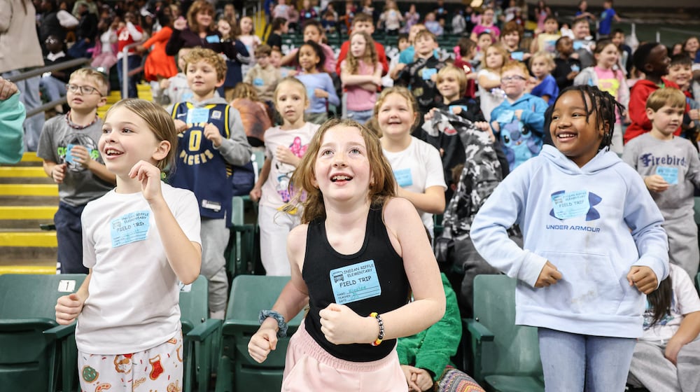 Students from Indian Riffle Elementary School in Kettering dance during Wright State's womens basketball team's Education Day game against Bellarmine on Wednesday, Nov. 19 at the Nutter Center in Fairborn. Over 30 schools attended the game. The Raiders lost 83-76 in overtime. BRYANT BILLING/STAFF
