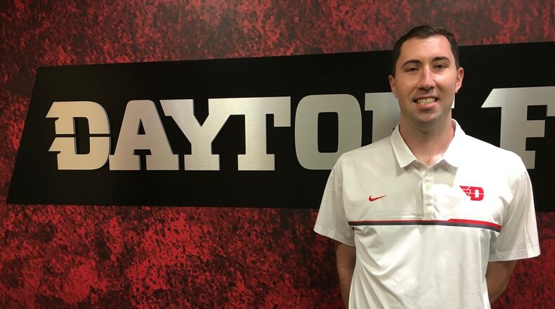 Dayton women’s basketball assistant coach Ryan Gensler poses for a photo at UD’s Cronin Center on Friday, June 29, 2017, in Dayton. David Jablonski/Staff