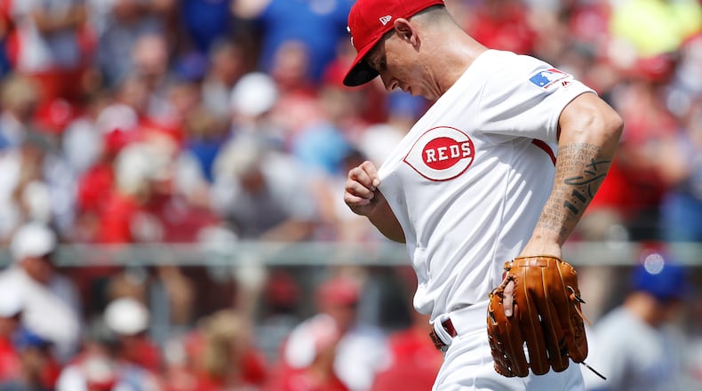 CINCINNATI, OH - AUGUST 11: Michael Lorenzen #21 of the Cincinnati Reds reacts after giving up the lead on a three-run home run by Kris Bryant of the Chicago Cubs in the seventh inning at Great American Ball Park on August 11, 2019 in Cincinnati, Ohio. The Cubs defeated the Reds 6-3. (Photo by Joe Robbins/Getty Images)