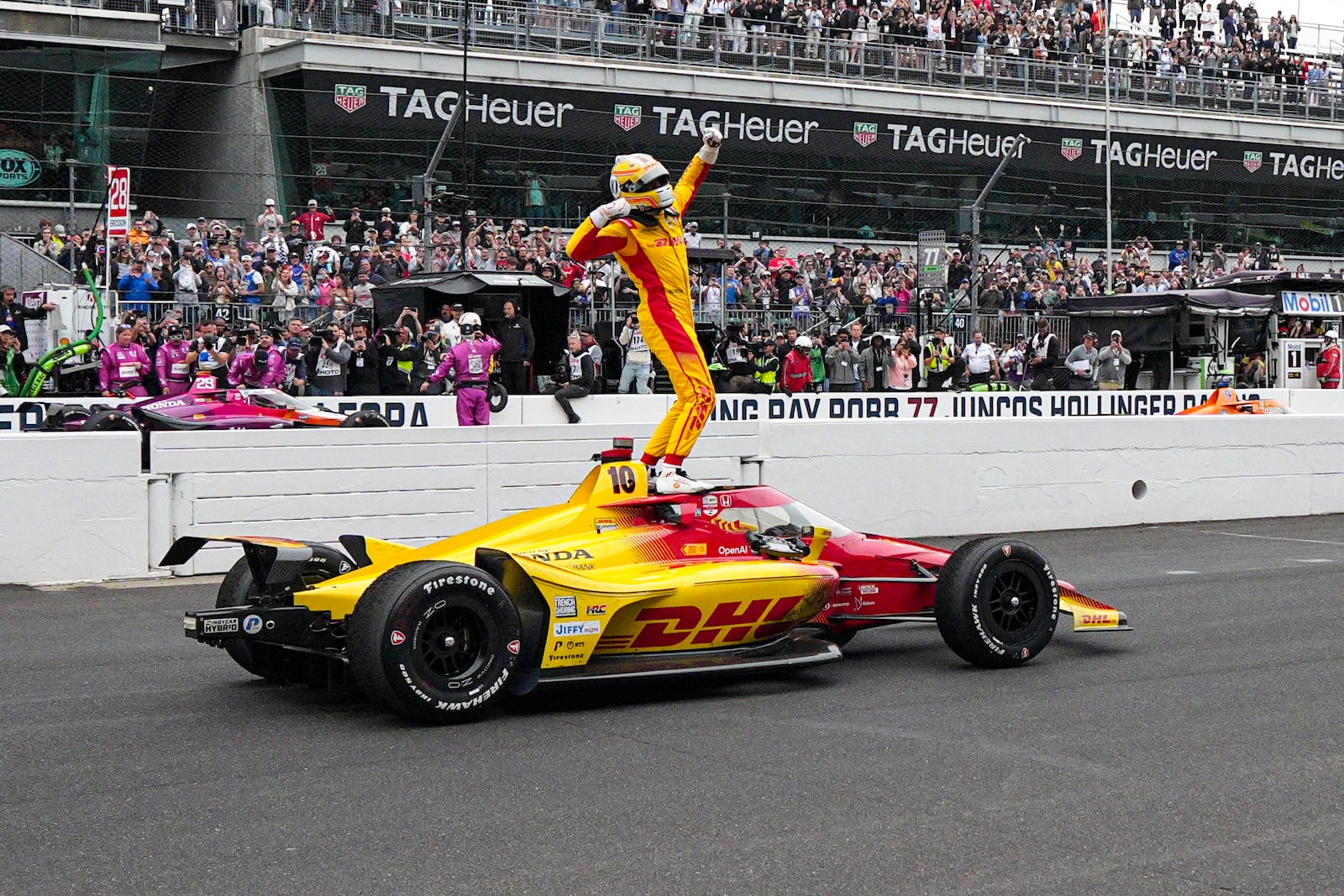 Alex Palou, of Spain, celebrates after winning the Indianapolis 500 auto race at Indianapolis Motor Speedway in Indianapolis, Sunday, May 25, 2025. (AP Photo/AJ Mast)