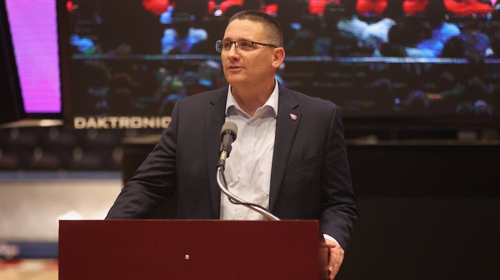 Dayton Athletic Director Neil Sullivan speaks at The Spotlight Town Hall, a mental health event, on Wednesday, Oct. 9, 2024, at UD Arena in Dayton. David Jablonski/Staff