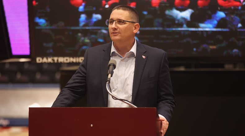 Dayton Athletic Director Neil Sullivan speaks at The Spotlight Town Hall, a mental health event, on Wednesday, Oct. 9, 2024, at UD Arena in Dayton. David Jablonski/Staff