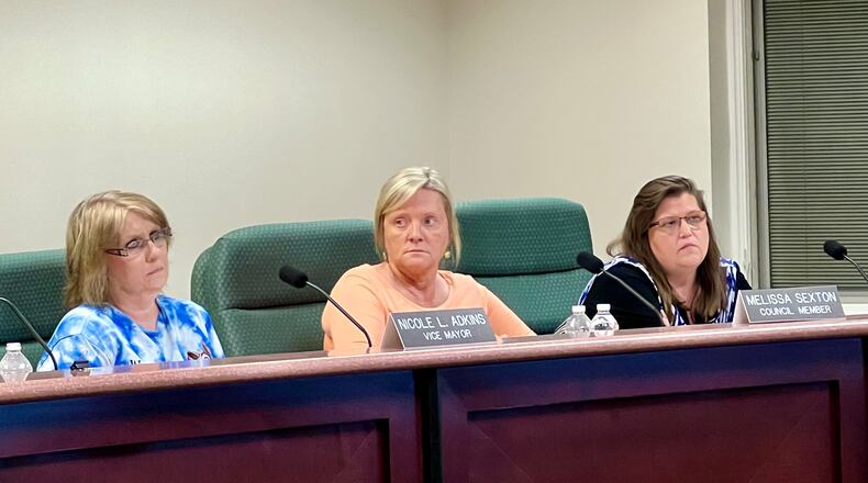 New Lebanon Village Vice Mayor Nicole Adkins, left, along with council members Melissa Sexton, center, and Tammy Loch during the May 7, 2024, regular meeting. AIMEE HANCOCK/STAFF