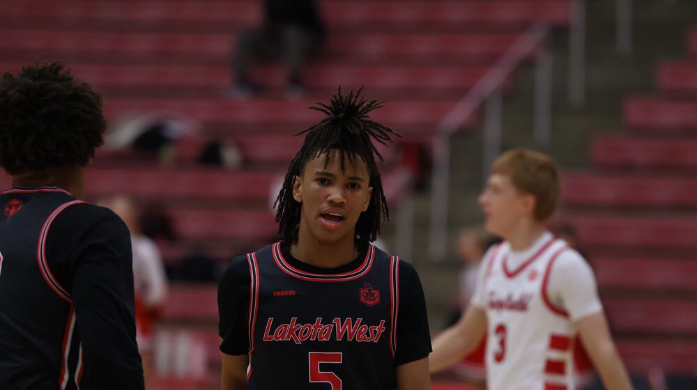 Lakota West sophomore Andre Richardson walks down the court during a timeout against Fairfield on Tuesday night at Fairfield Arena. ELIJAH COOK / CONTRIBUTER