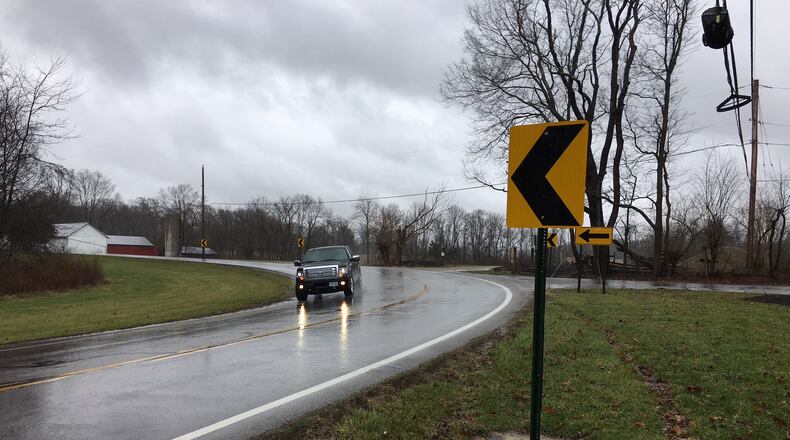 A plan by Oberer Homes for a residential development must accommodate a long-standing plan to straighten the 90-degree turn at Wilmington Pike and Conference Road. Richard Wilson/Staff