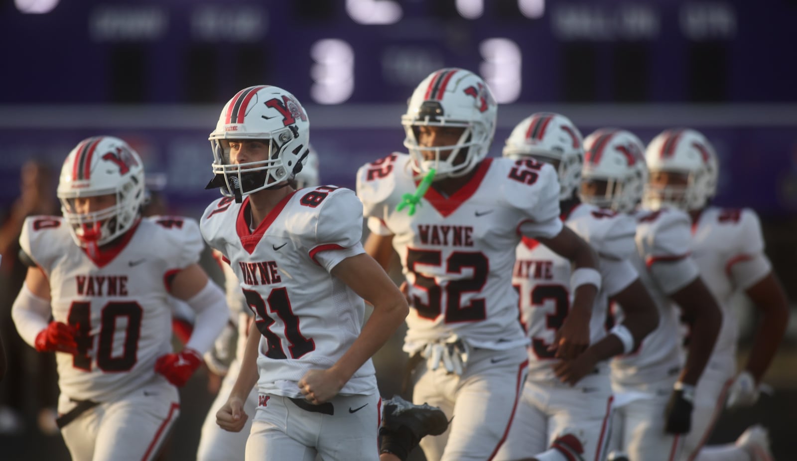 Wayne takes the field for a game against Pickerington Central on Friday, Aug. 29, 2025, in Pickerington. David Jablonski/Staff