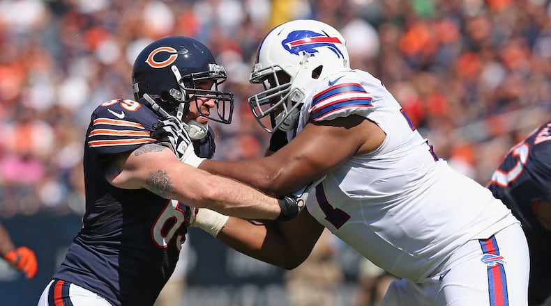 CHICAGO, IL - SEPTEMBER 07:  Jared Allen #69 of the Chicago Bears rushes against Cordy Glenn #77 of the Buffalo Bills at Soldier Field on September 7, 2014 in Chicago, Illinois. The Bills defeated the Bears 23-20 in overtime.  (Photo by Jonathan Daniel/Getty Images)