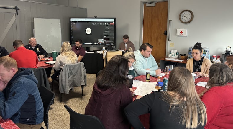Representatives of agencies working regularly with Miami County’s Child Advocacy Center gathered in December for discussion and to observe the program’s first year of service. CONTRIBUTED